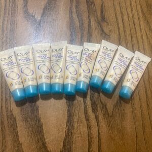 9 Olay Complete Touch of Sun Face Moisturizer With Sunless Tanner .23 Sample Siz